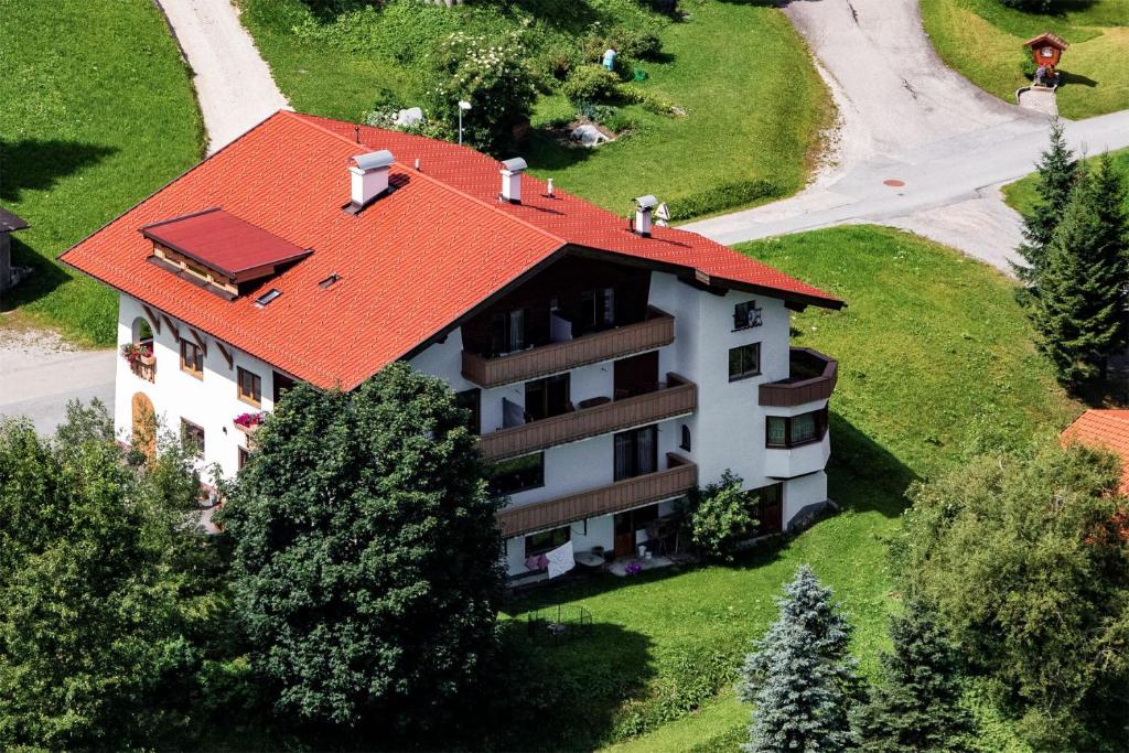 an overhead view of a house with an orange roof at Haus Schöne Aussicht in Berwang