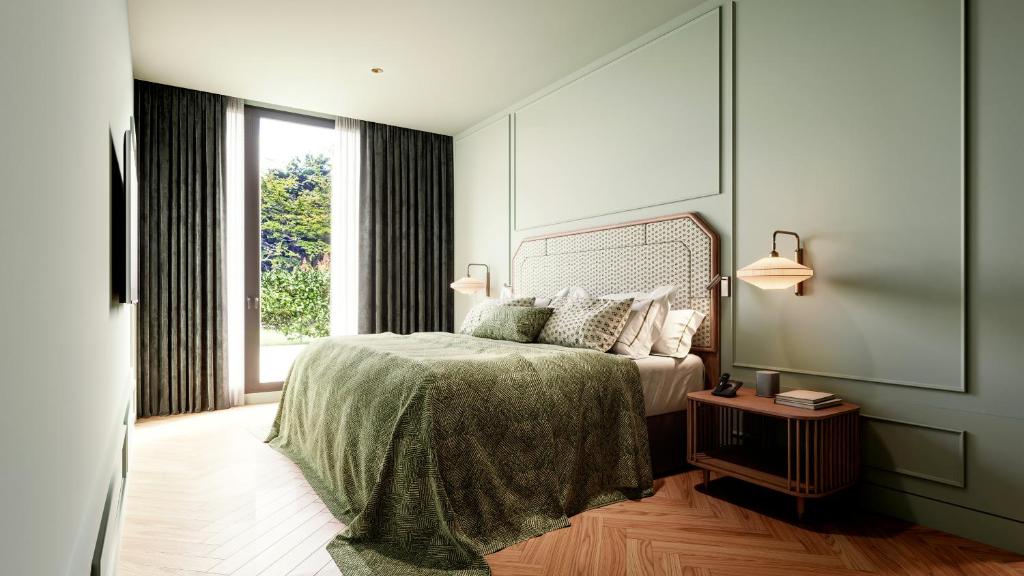 Cama o camas de una habitación en CoolRooms Palacio de Luces