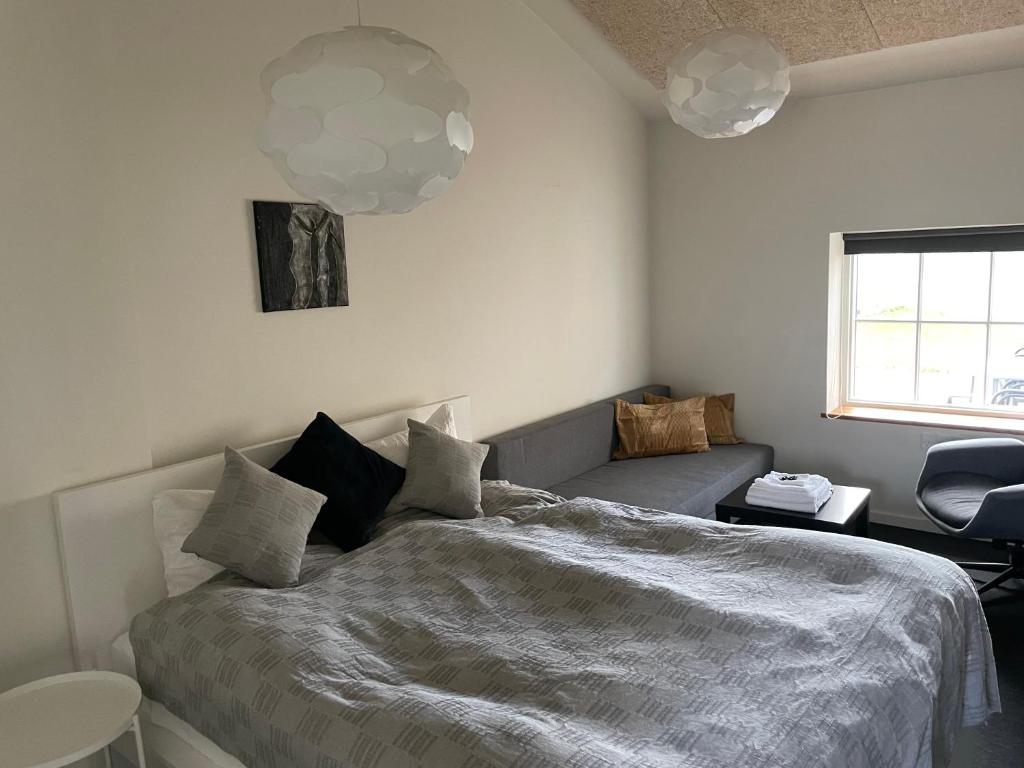 Postel nebo postele na pokoji v ubytování Essenbaekgaard B&B