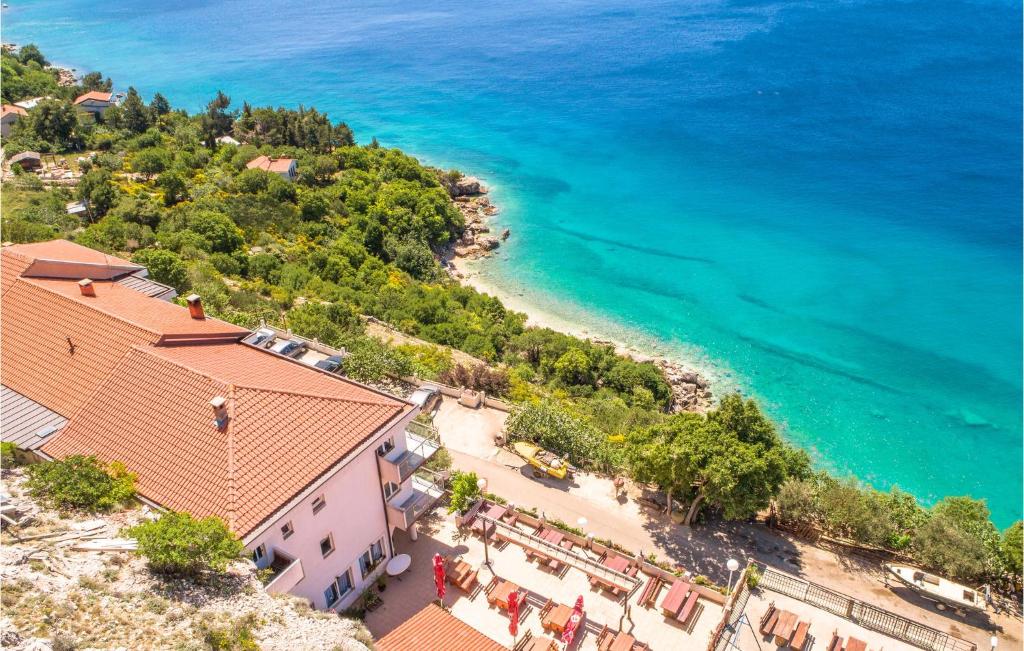 an aerial view of a beach and the ocean at Lovely Apartment In Stara Baska 1 With Kitchen in Stara Baška