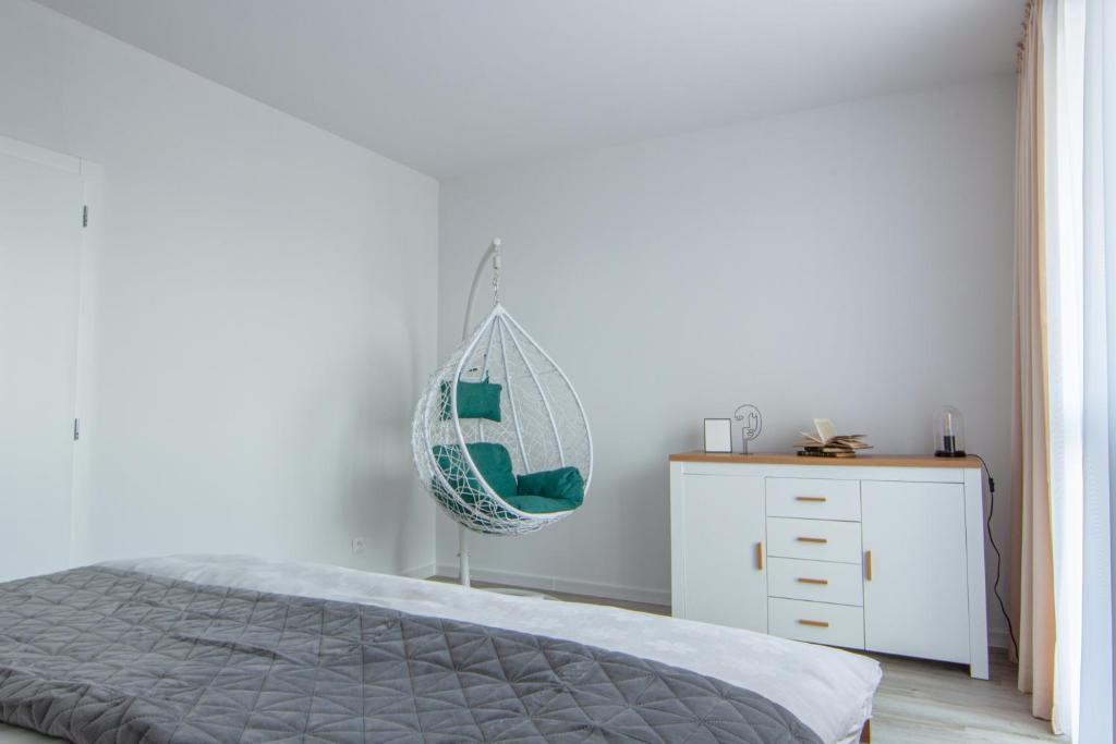 Posteľ alebo postele v izbe v ubytovaní LAWIS Apartments