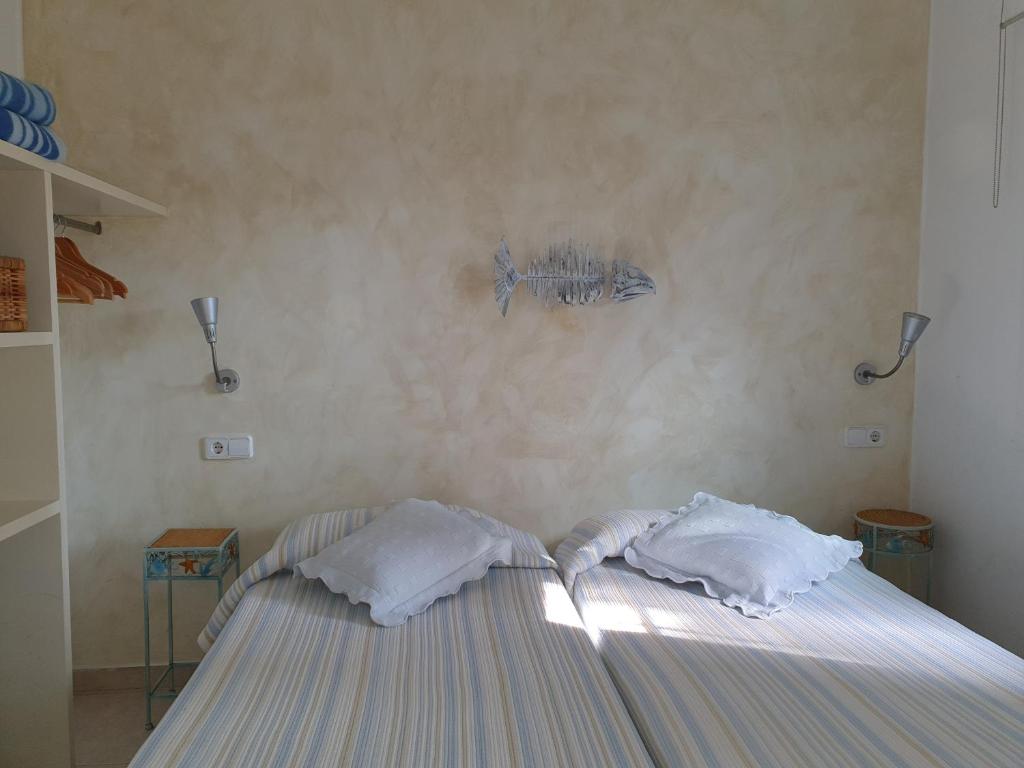 Postel nebo postele na pokoji v ubytování Apartaments Les Roques