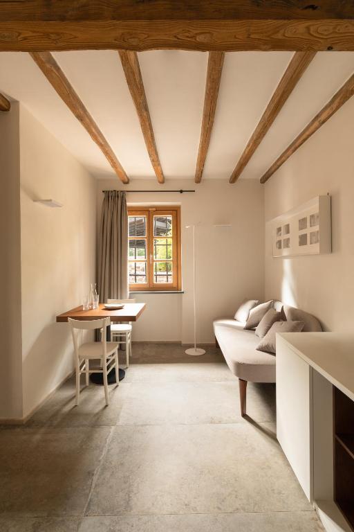 Posezení v ubytování Antico Borgo Molino 7cento vicino ai Giardini di Ninfa