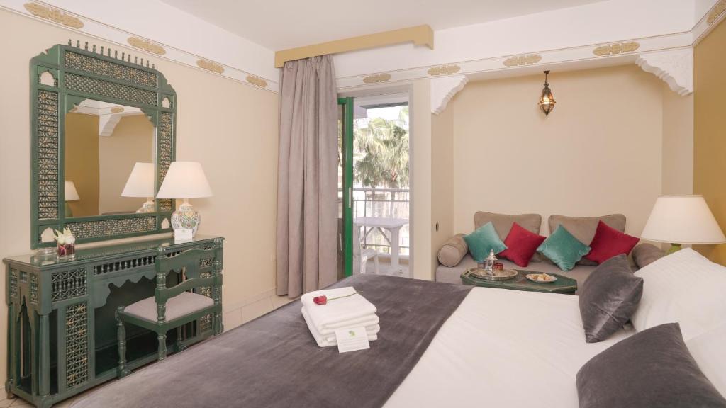Postel nebo postele na pokoji v ubytování Agadir Beach Club