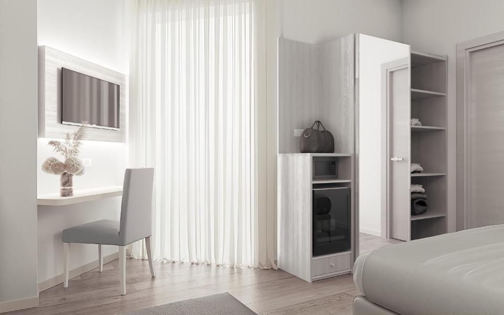 A kitchen or kitchenette at Hotel Fabius