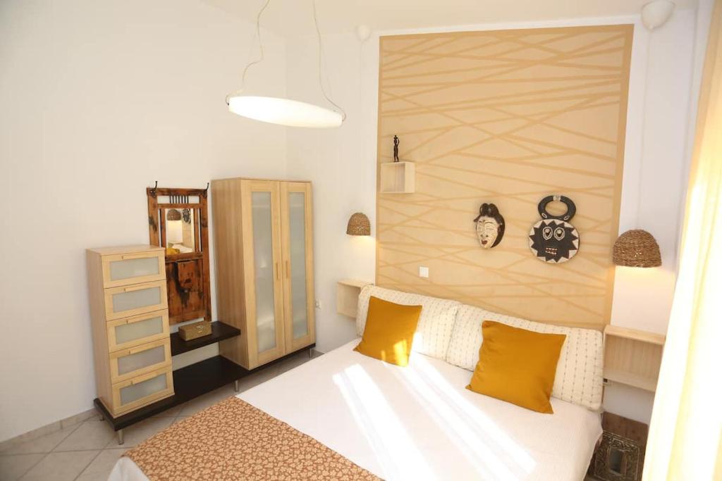Postel nebo postele na pokoji v ubytování Villa Asterios