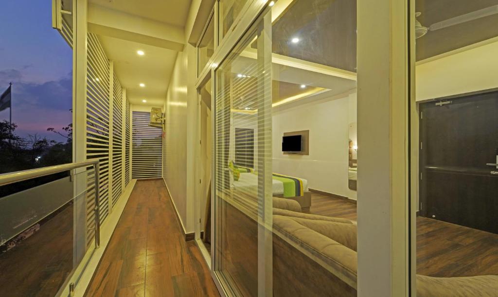 Balkón nebo terasa v ubytování Treebo Premium Raffis' Andalusia Bay Way