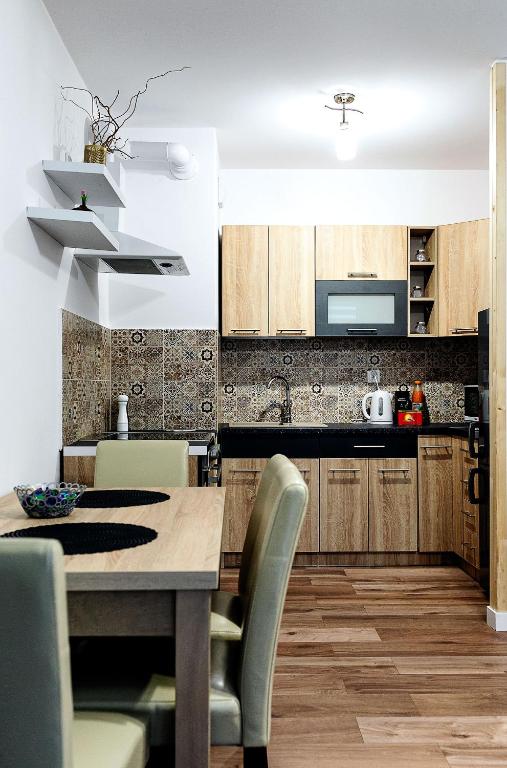 Kuchyň nebo kuchyňský kout v ubytování Apartament Boryna