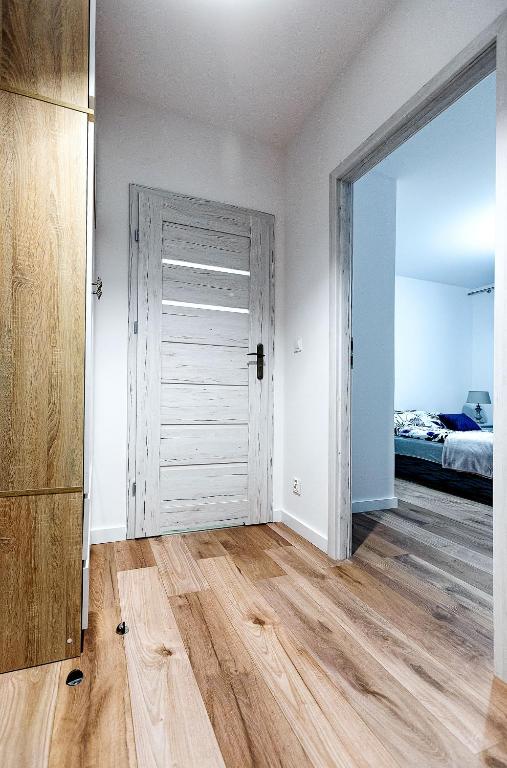 Postel nebo postele na pokoji v ubytování Apartament Boryna