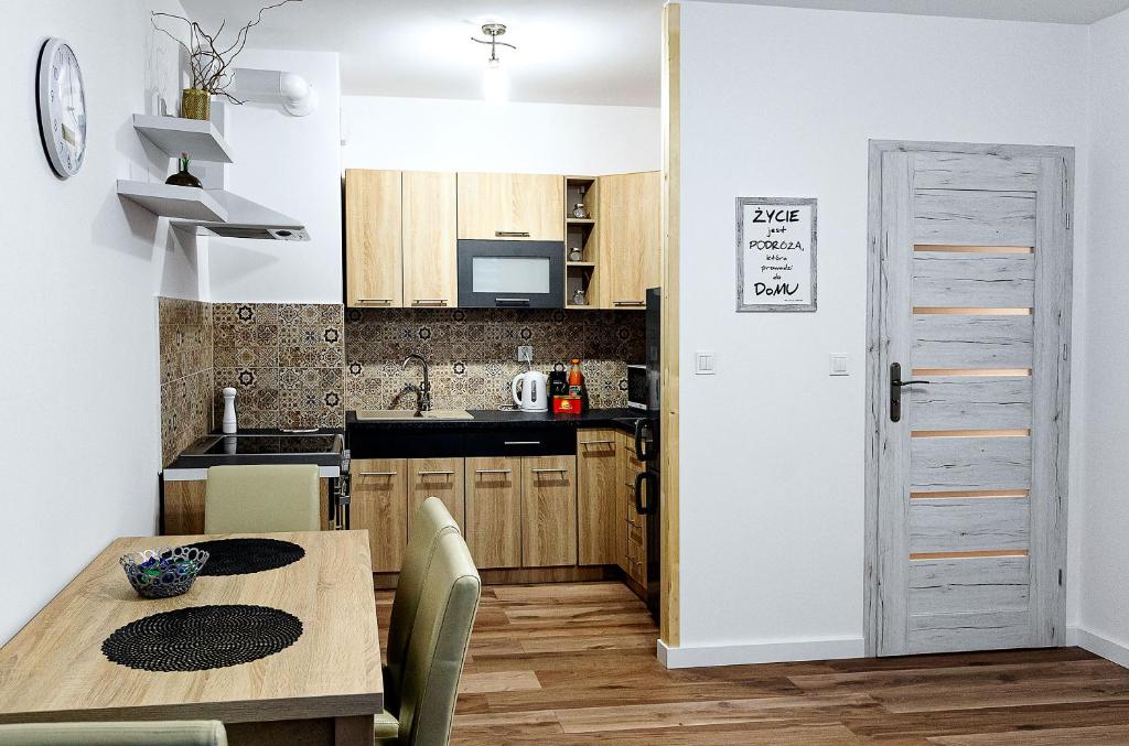 Kuchyň nebo kuchyňský kout v ubytování Apartament Boryna