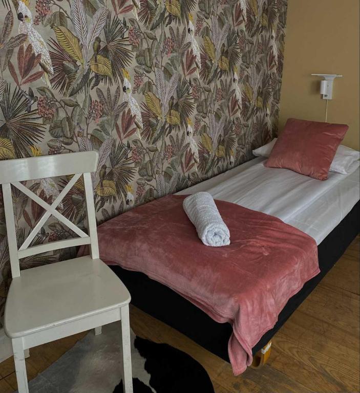 Postel nebo postele na pokoji v ubytování Lilla Brunn