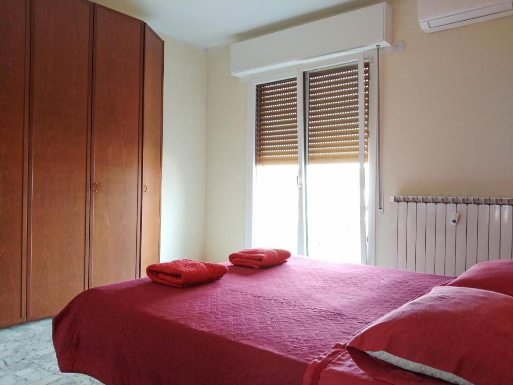 Postel nebo postele na pokoji v ubytování Casa Bignardi - Affitti Brevi Italia