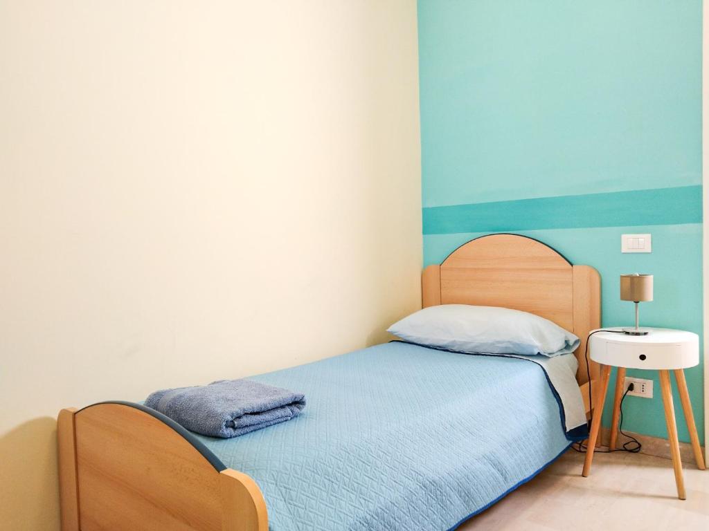 Postel nebo postele na pokoji v ubytování Casa Bignardi - Affitti Brevi Italia