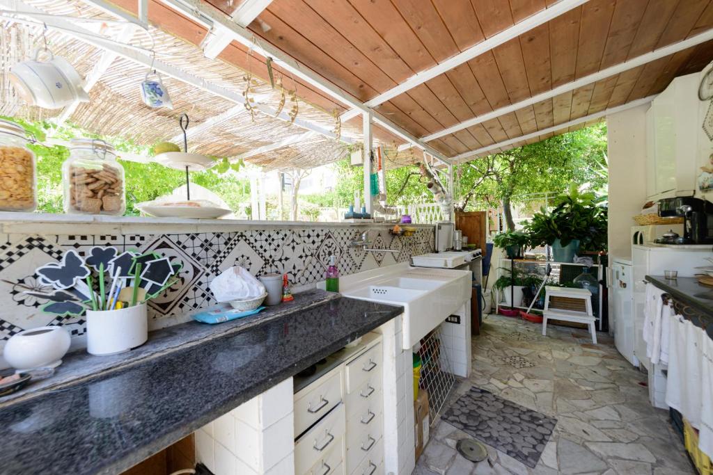 Kuchnia lub aneks kuchenny w obiekcie Giardino Segreto