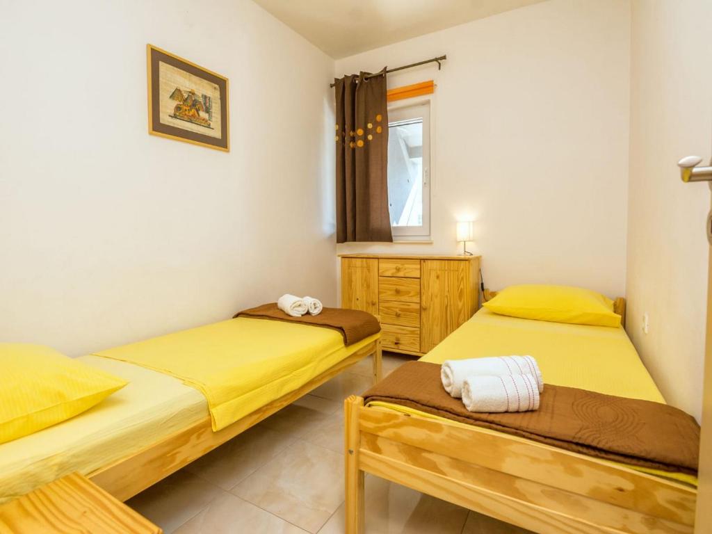 Posteľ alebo postele v izbe v ubytovaní Holiday Home Marinela