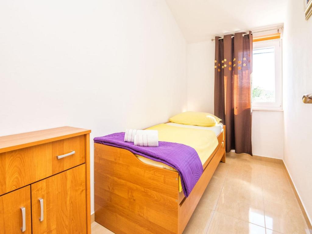 Posteľ alebo postele v izbe v ubytovaní Holiday Home Marinela