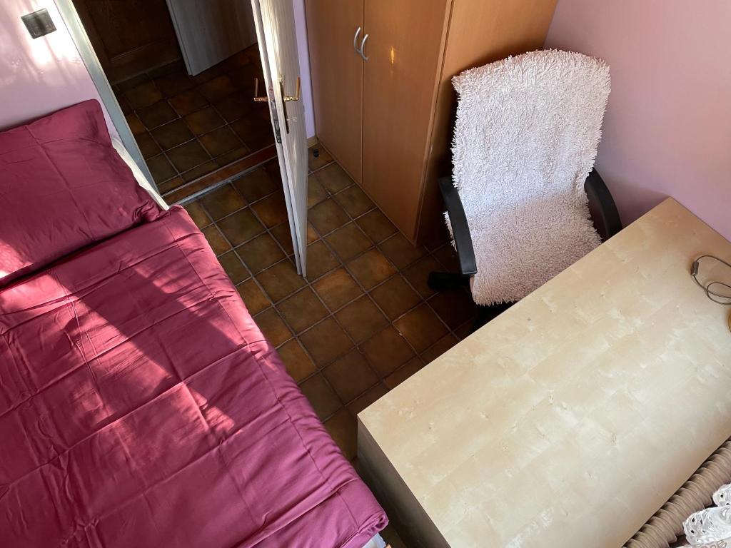 Postel nebo postele na pokoji v ubytování Suburb Hostel