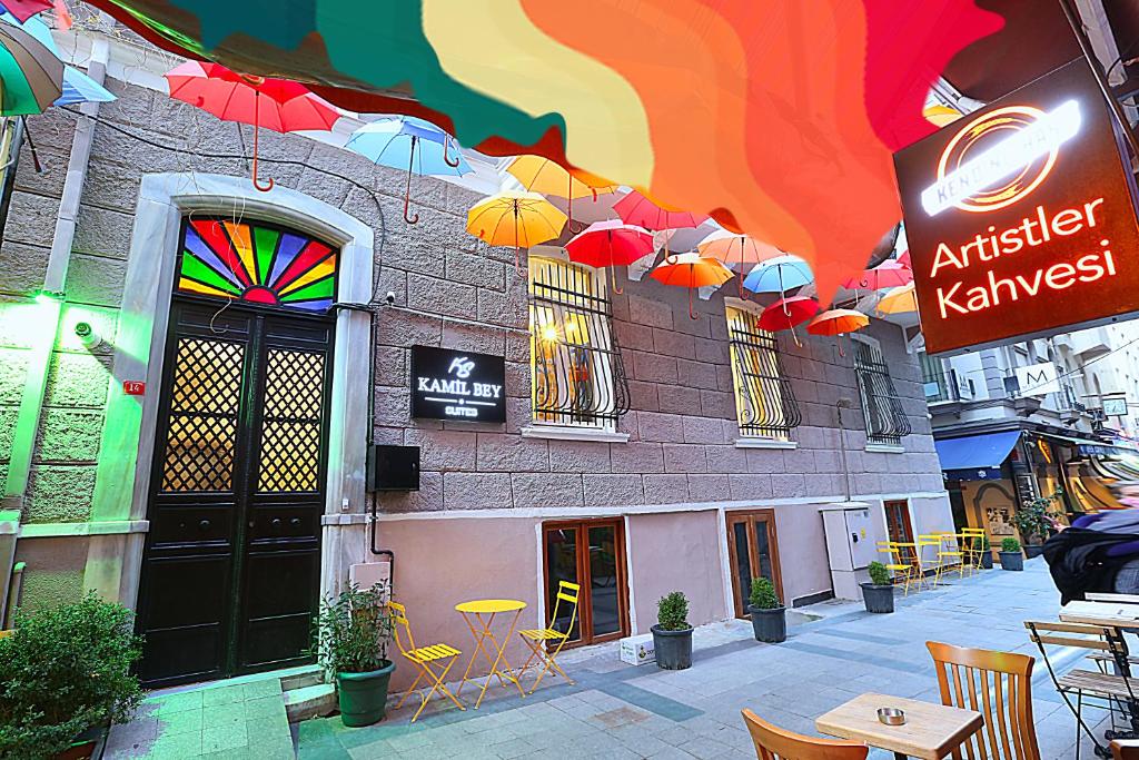 a building with a bunch of umbrellas hanging from it at Kamil Bey Suites Hotel in Istanbul