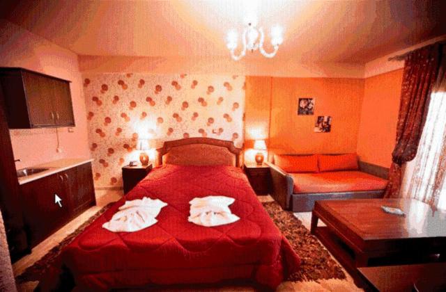 Ένα ή περισσότερα κρεβάτια σε δωμάτιο στο Silva Suites