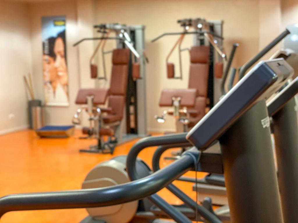 Centrum fitness w obiekcie Best Western Plus Hotel Le Favaglie