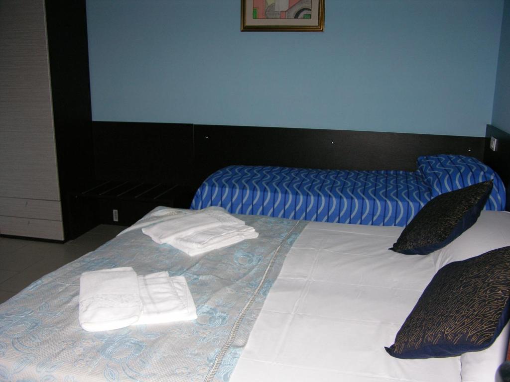 Postel nebo postele na pokoji v ubytování B&B Angolo Felice