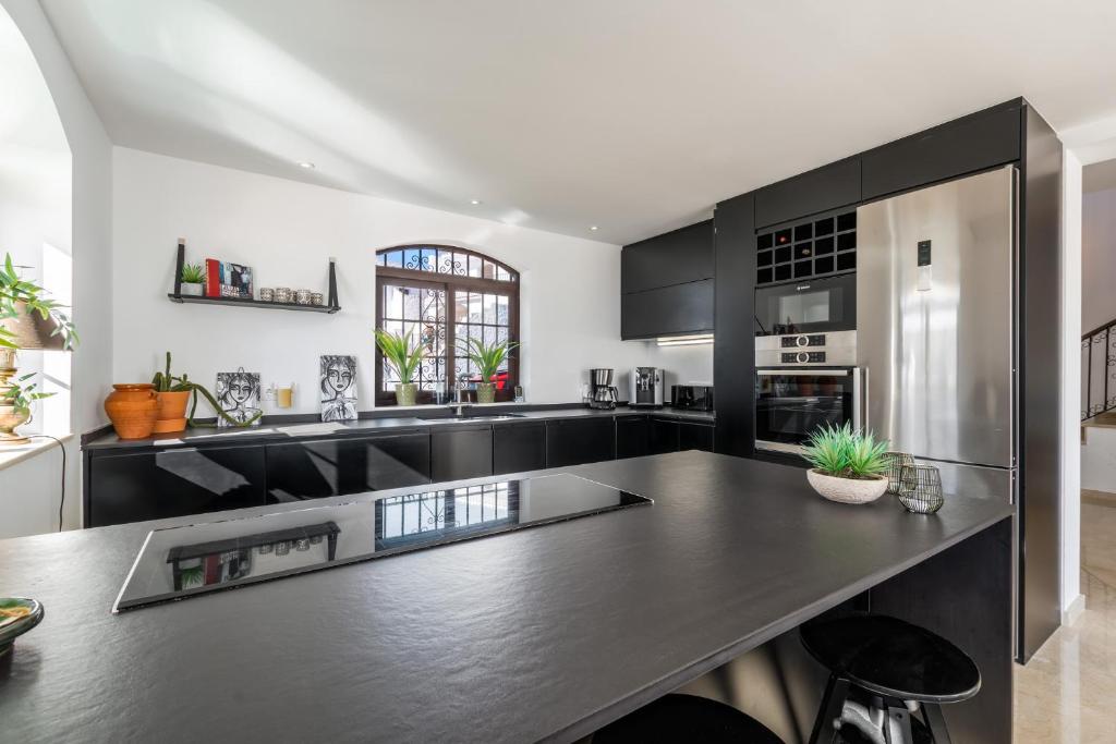 Kuchyň nebo kuchyňský kout v ubytování Villa Caroline