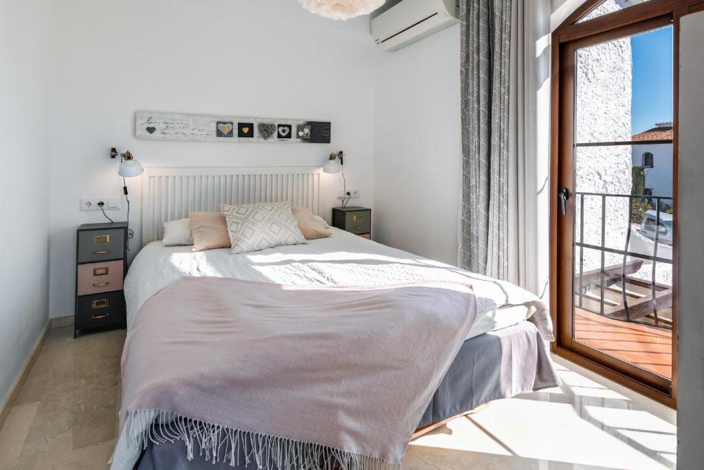 Postel nebo postele na pokoji v ubytování Villa Caroline