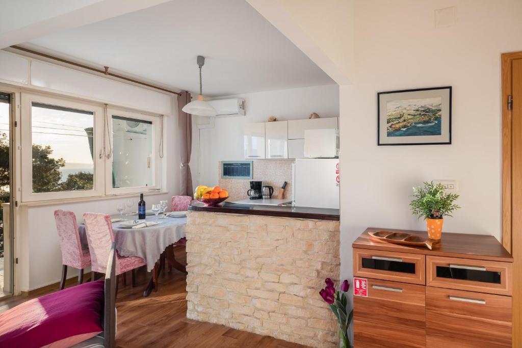 Kuchyň nebo kuchyňský kout v ubytování Beach Apartment Milena
