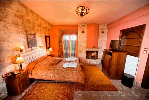 Ένα ή περισσότερα κρεβάτια σε δωμάτιο στο Silva Suites