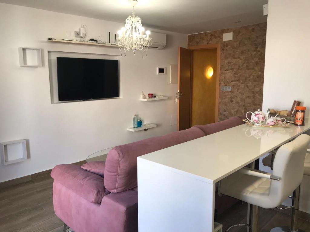 Posezení v ubytování Apartamento con terraza cerca del Paseo Marítimo