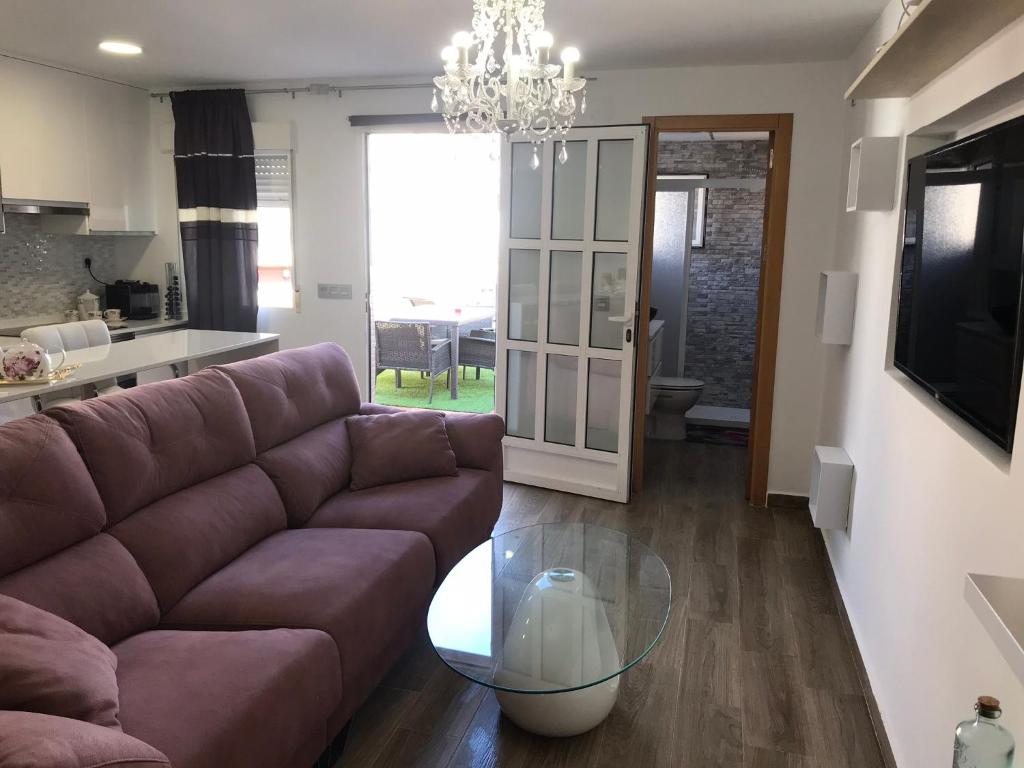 Posezení v ubytování Apartamento con terraza cerca del Paseo Marítimo