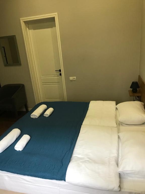 Postel nebo postele na pokoji v ubytování Hotel Loft