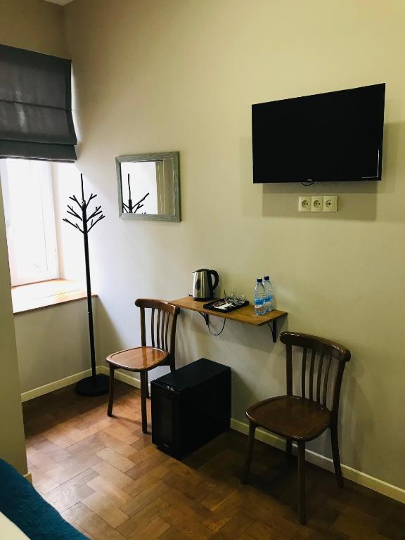 TV a/nebo společenská místnost v ubytování Hotel Loft