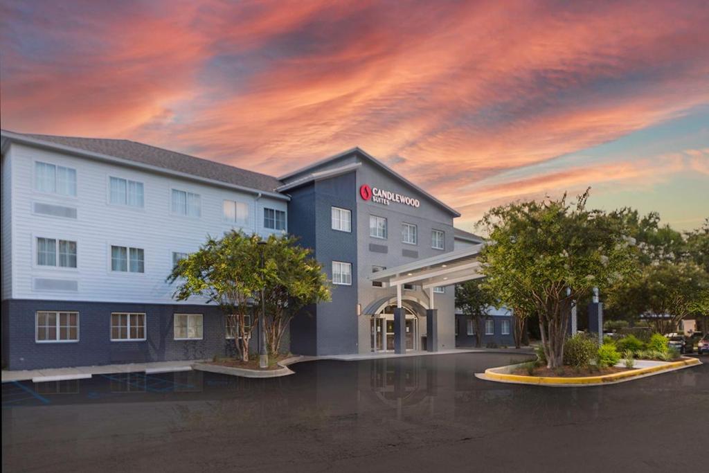 a rendering of a hotel with a sunset at Candlewood Suites Charleston – Mt. Pleasant by IHG in Charleston