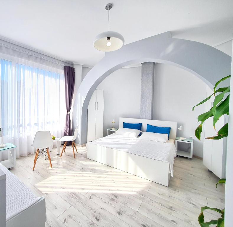 Postel nebo postele na pokoji v ubytování Hotel JoAn