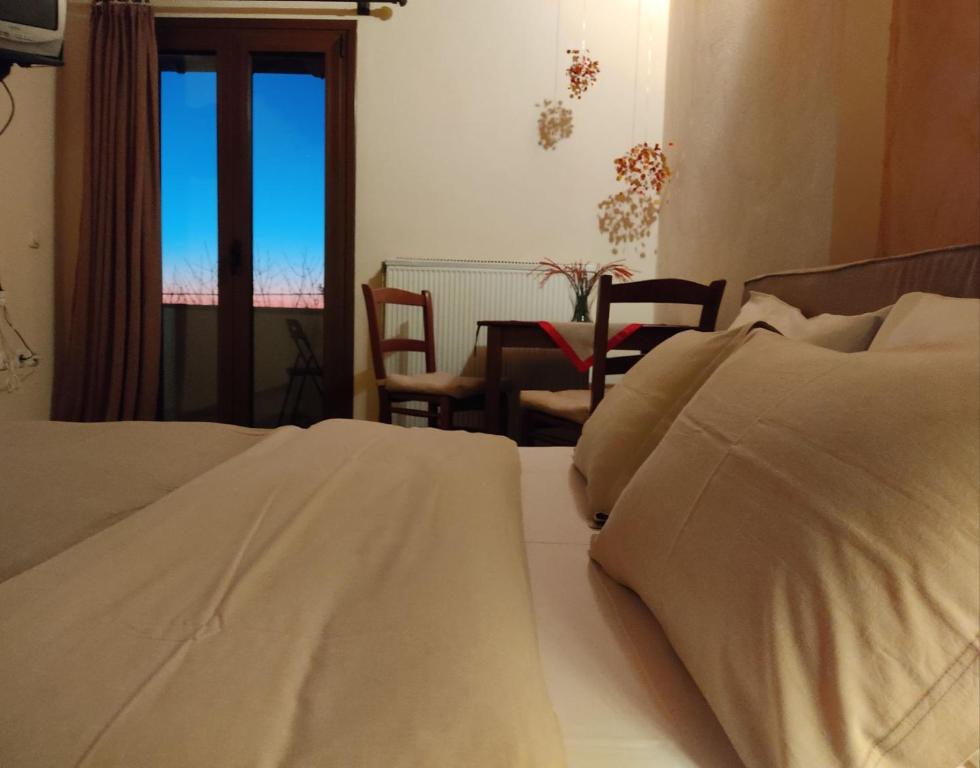 Posteľ alebo postele v izbe v ubytovaní Klio Guesthouse