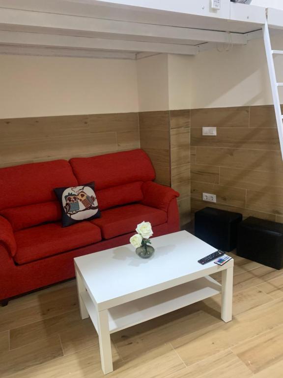 Posedenie v ubytovaní APARTAMENTOS HÉRCULES SEVILLa