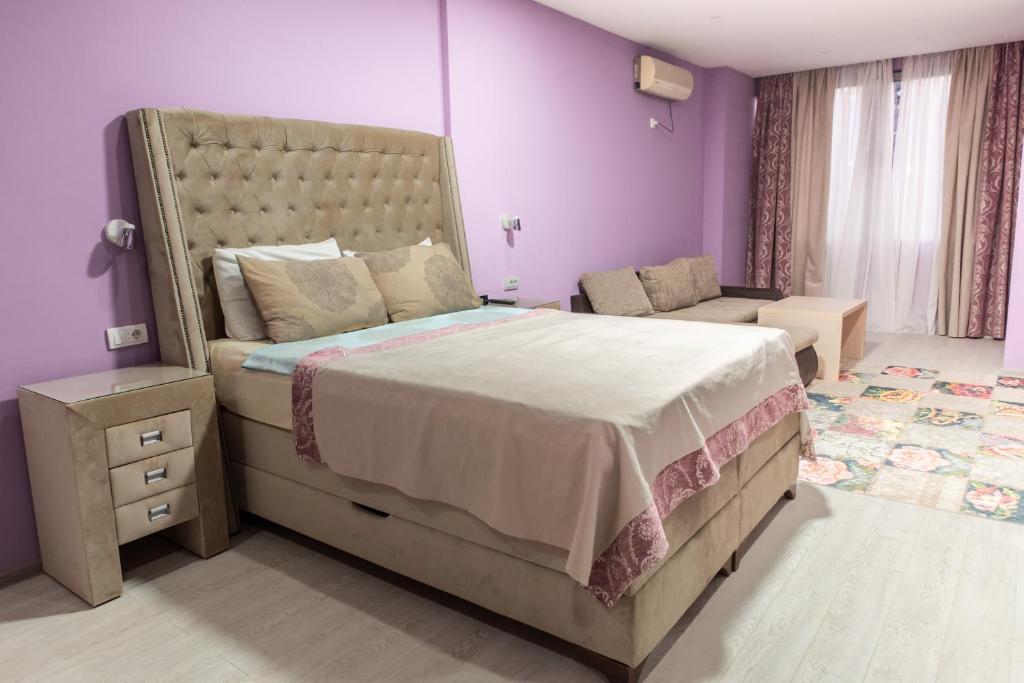 Postel nebo postele na pokoji v ubytování Hotel Gold