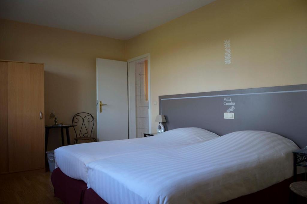 Postel nebo postele na pokoji v ubytování Villa Cambo
