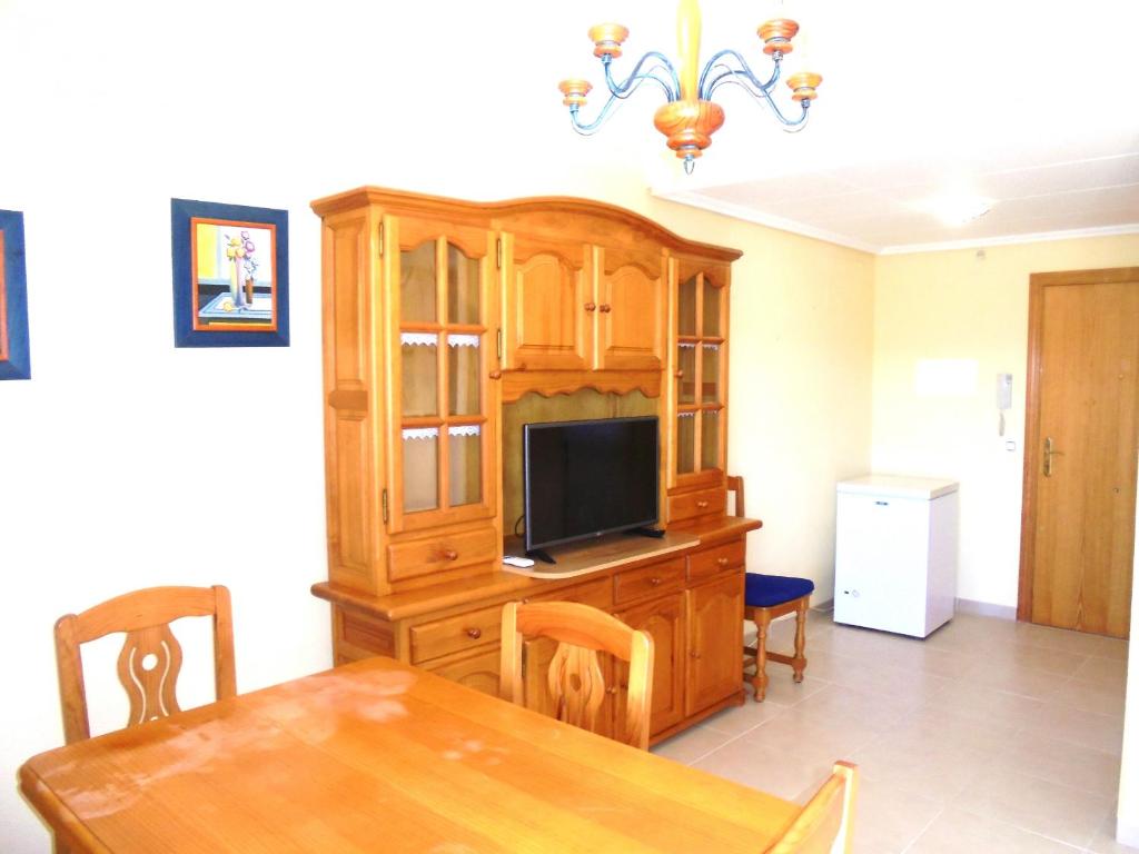 Televízia a/alebo spoločenská miestnosť v ubytovaní Miami Residencial LEK
