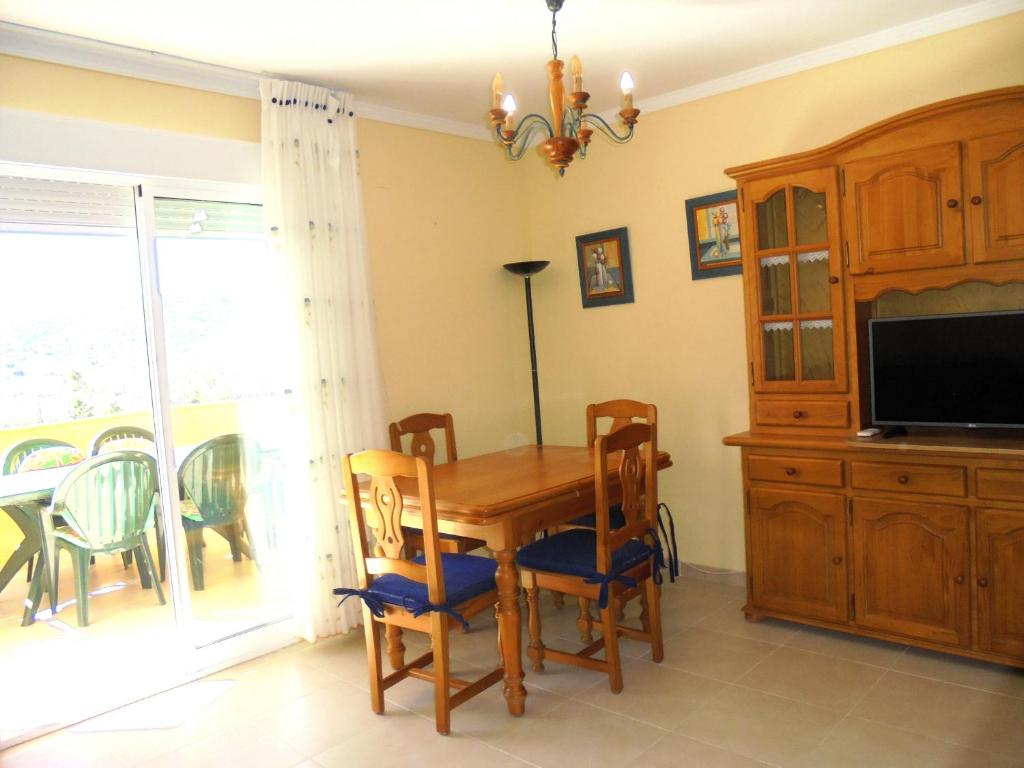 Televízia a/alebo spoločenská miestnosť v ubytovaní Miami Residencial LEK