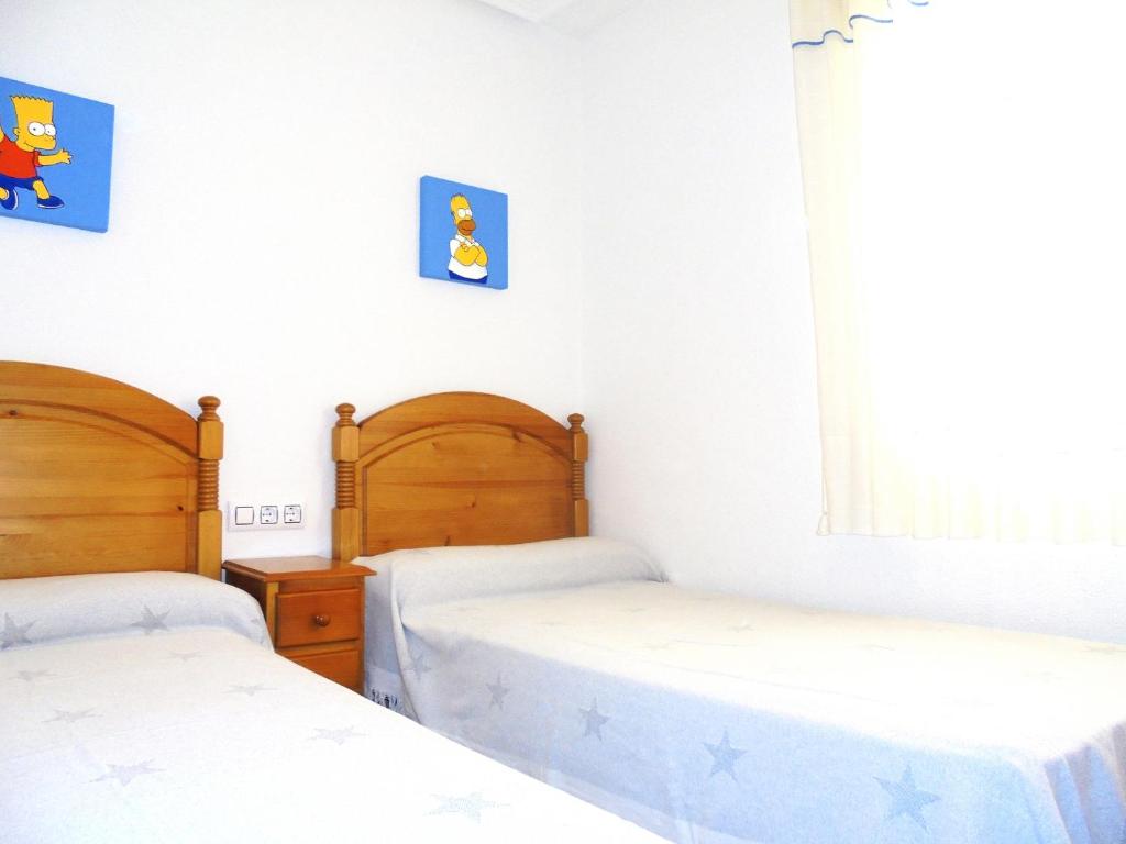 Posteľ alebo postele v izbe v ubytovaní Miami Residencial LEK