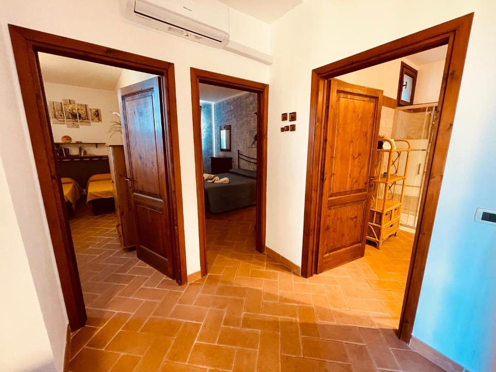 A bed or beds in a room at Casetta Luna e Sole