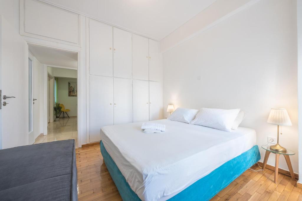Postel nebo postele na pokoji v ubytování Athens Dreams & Suites Apartments
