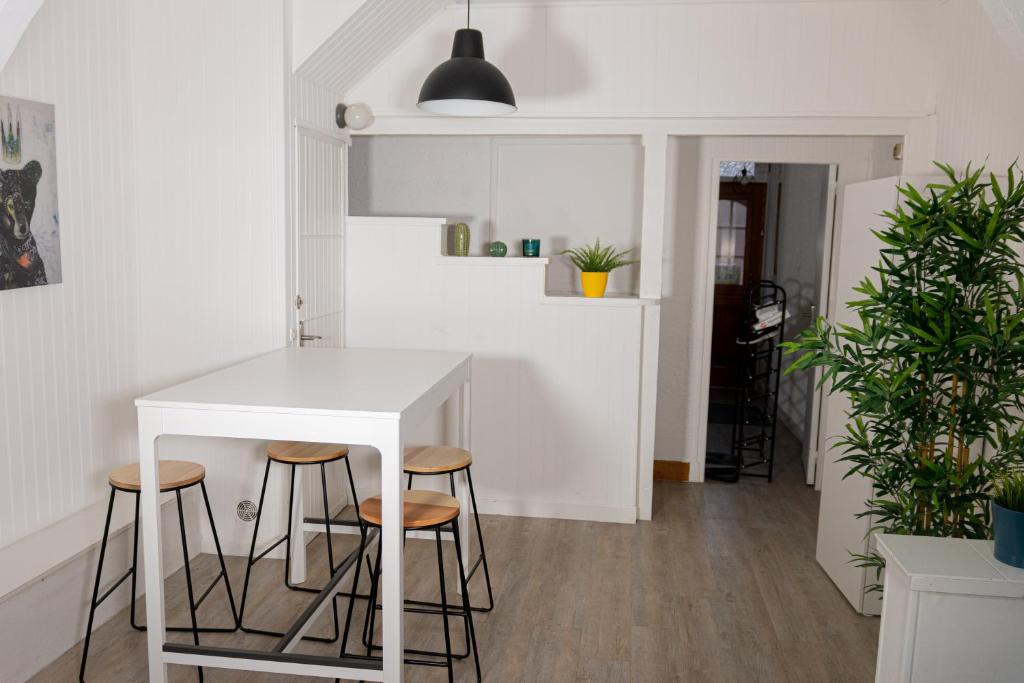 Kuchyň nebo kuchyňský kout v ubytování Uniq Home
