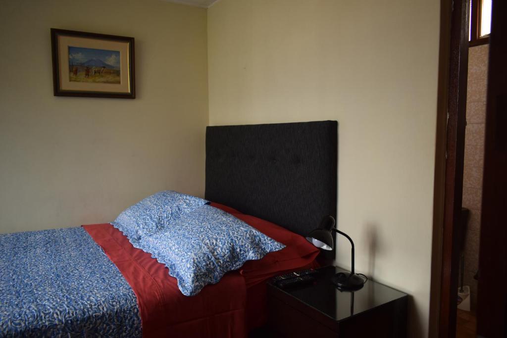 Postel nebo postele na pokoji v ubytování Hostal Donde Alberto