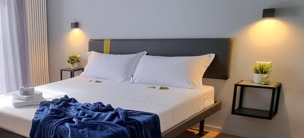 Postel nebo postele na pokoji v ubytování Residenza Gramsci