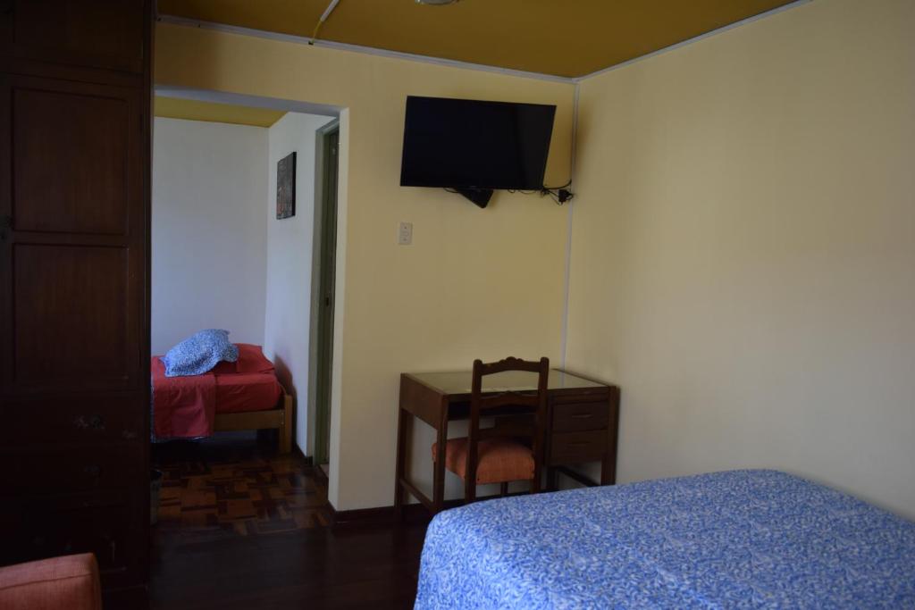 Postel nebo postele na pokoji v ubytování Hostal Donde Alberto