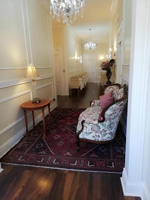 Posezení v ubytování Belle Epoque Hostal