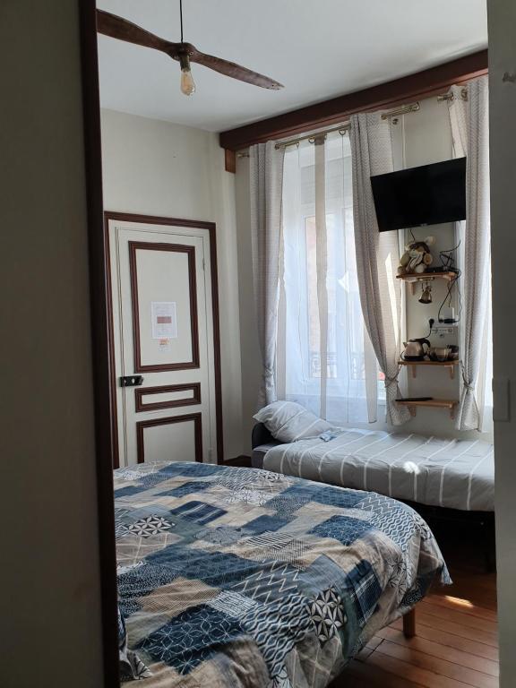 Кровать или кровати в номере B & B Les Secrets des Loges